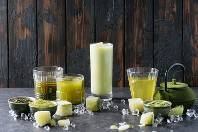 Fruits in glass on table