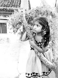 Portrait of girl on tree