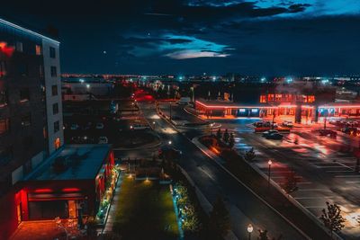 High angle view of illuminated city at night