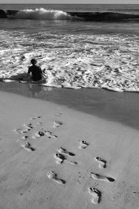 Rear view of man on beach