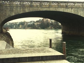 Arch bridge over river