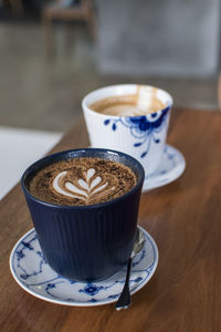 Close-up of coffee served on table