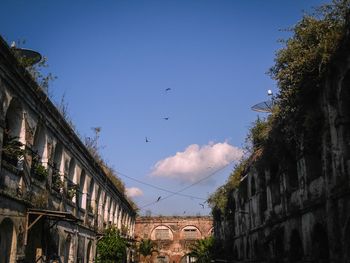 Low angle view of buildings against sky
