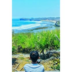 Scenic view of calm sea against clear sky