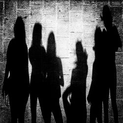 Shadow of people on street