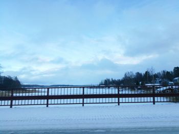 Scenic view of winter against sky