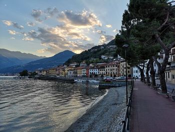 Panoramic view of buildings in city against sky during sunset