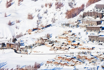 High angle view of snow covered trees on mountain