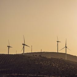 Traditional windmill on landscape