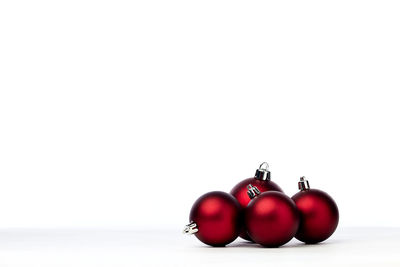 Close-up of christmas decoration against white background