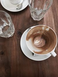 High angle view of coffee cup on table