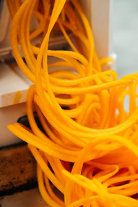 Making butternut squash noodles with a spiralizer