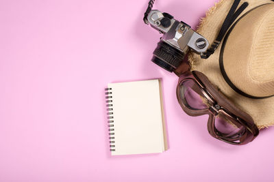 High angle view of pen and book on table