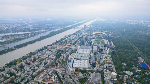 Aerial view of cityscape against sky