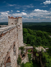 Old ruin building against cloudy sky