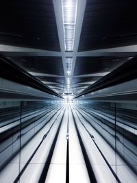 Reflection of moving walkway on mirror