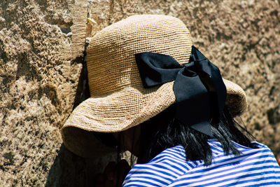 Rear view of woman wearing hat