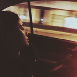 Close-up of woman in bus