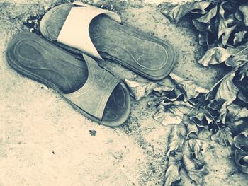 Pair of shoes on tiled floor