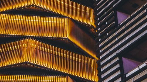 Low angle view of illuminated staircase in building