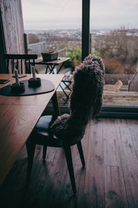 Empty chairs and table at home