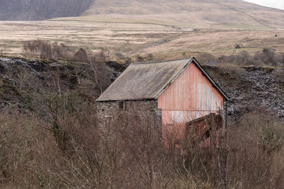 View of old building on field