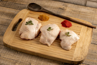High angle view of bread on cutting board
