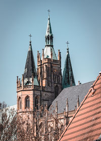 Low angle view of temple building against clear sky