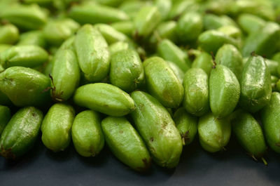 Close-up of green chili peppers