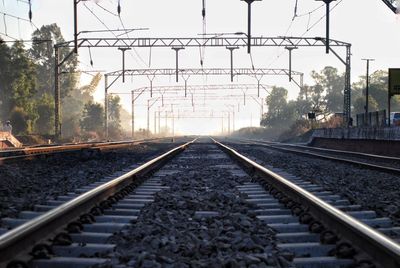 Railroad tracks against clear sky