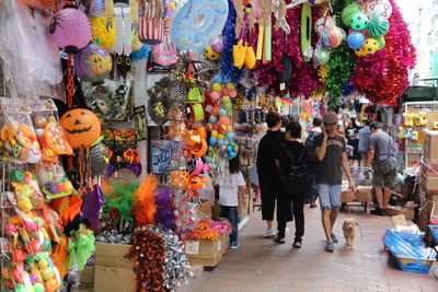 Group of people at market stall