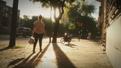 People on street in city