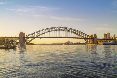 View of bridge over river in city