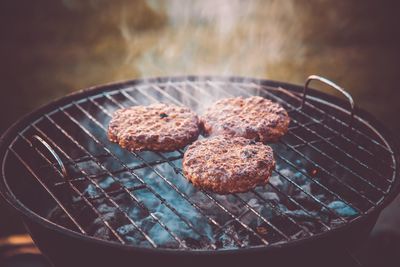 High angle view of meat on barbecue grill