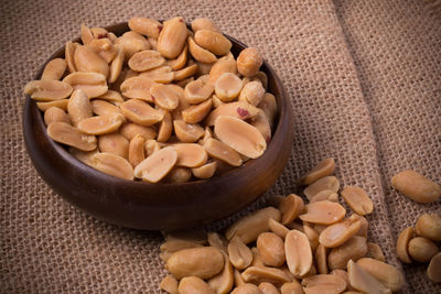 High angle view of roasted coffee beans in bowl