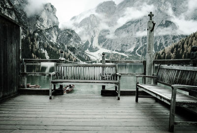 Pier over lake against sky