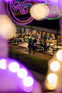 People on street at night