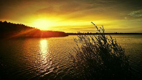 Scenic view of sunset over sea