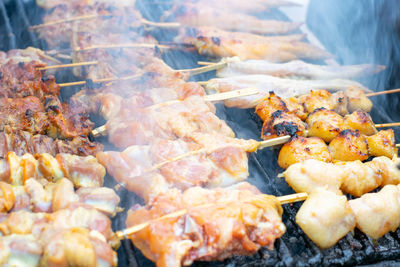 Close-up of meat on barbecue grill