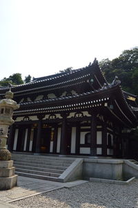 Entrance of temple against clear sky