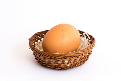 High angle view of wicker basket on white background