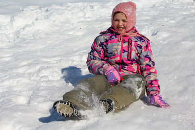 Full length of girl in snow