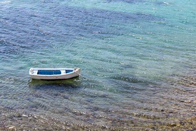 High angle view of boat sailing in sea