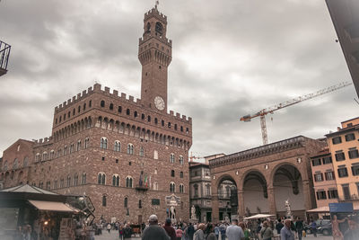 Group of people in front of building