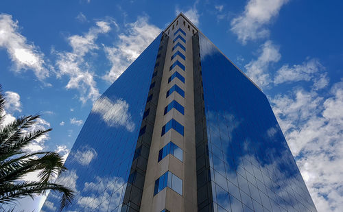 Low angle view of modern building against sky