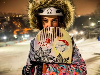 Portrait of young woman during winter