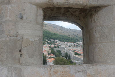 Historic building seen through arch