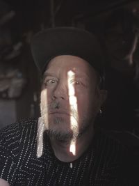 Portrait of man wearing hat