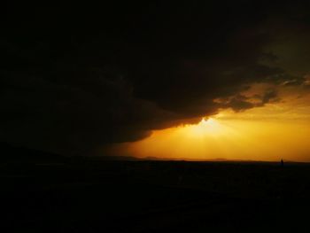 Scenic view of dramatic sky during sunset