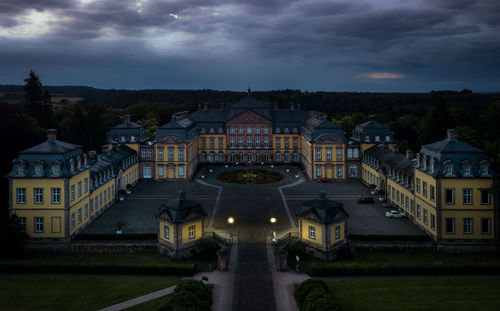 High angle view of buildings at night